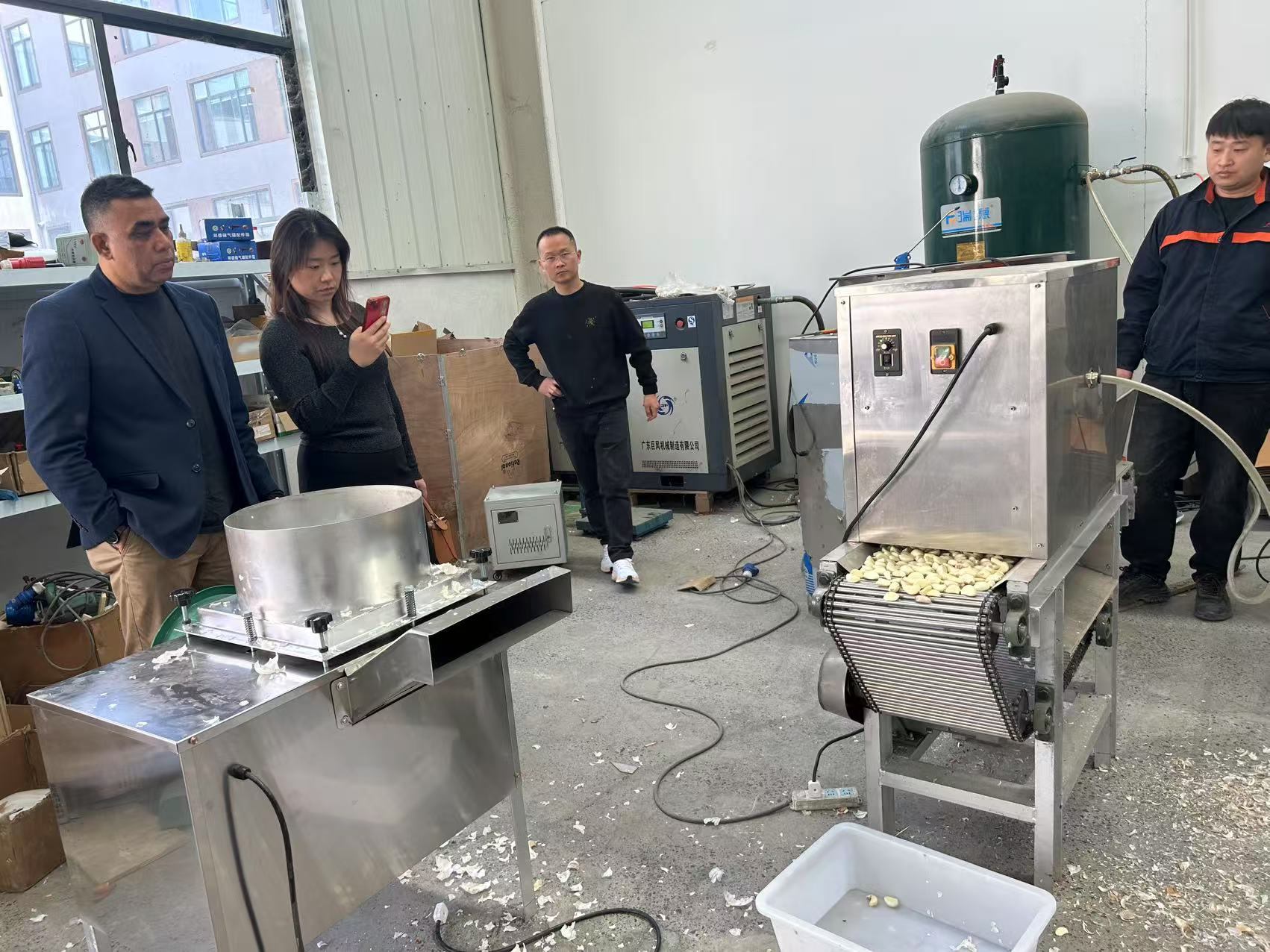 Chanda Machine  help overseas customers, garlic treatment production line successfully signed!